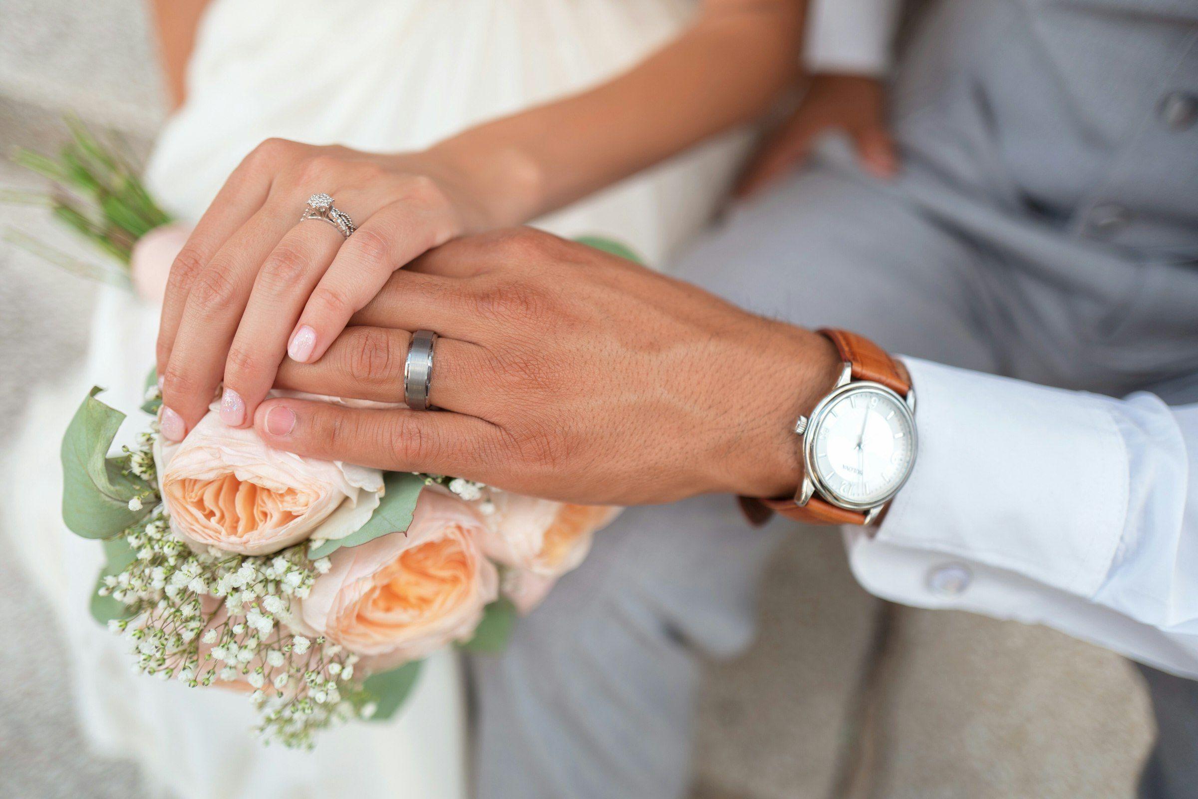 Bride holding a bouquet in soft natural light